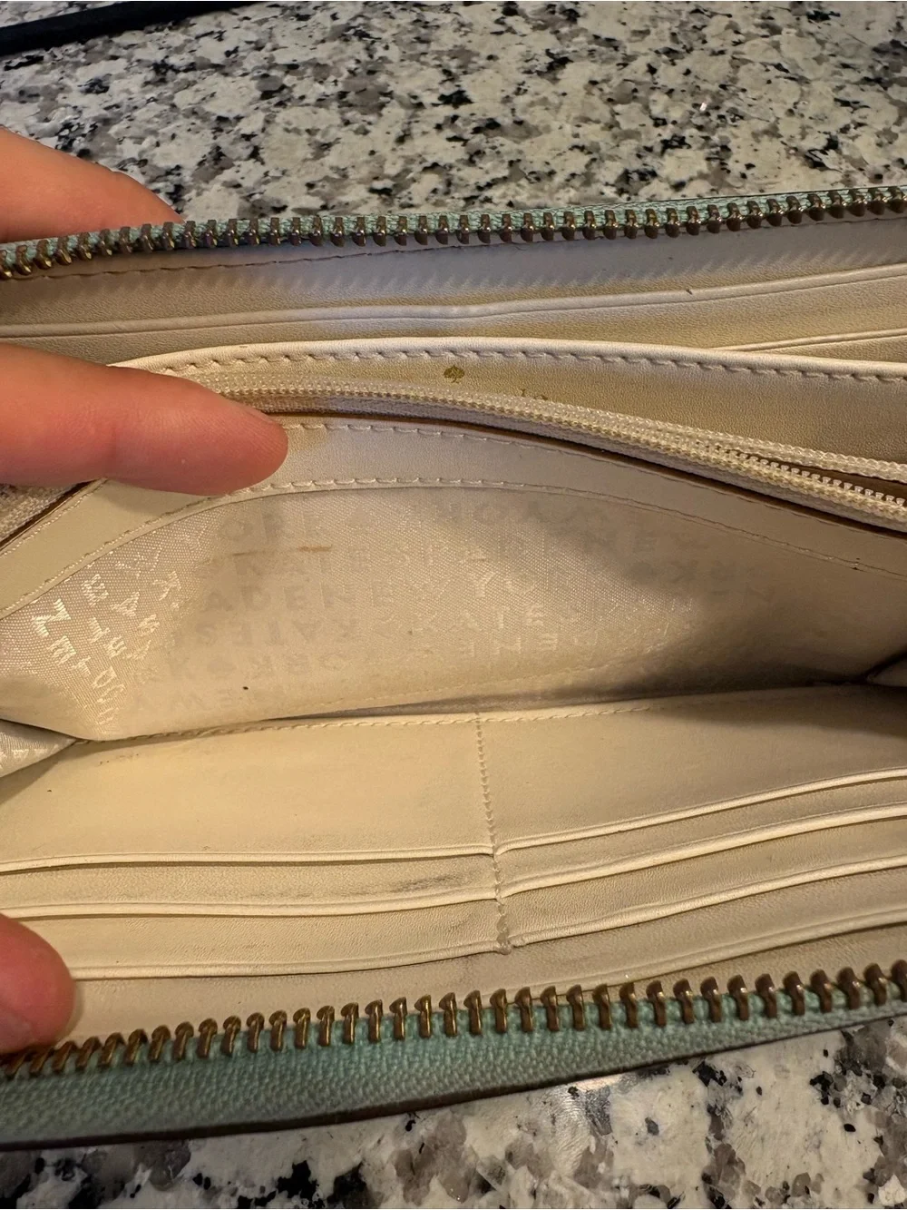 kate spade pastel blue zip-around leather wallet